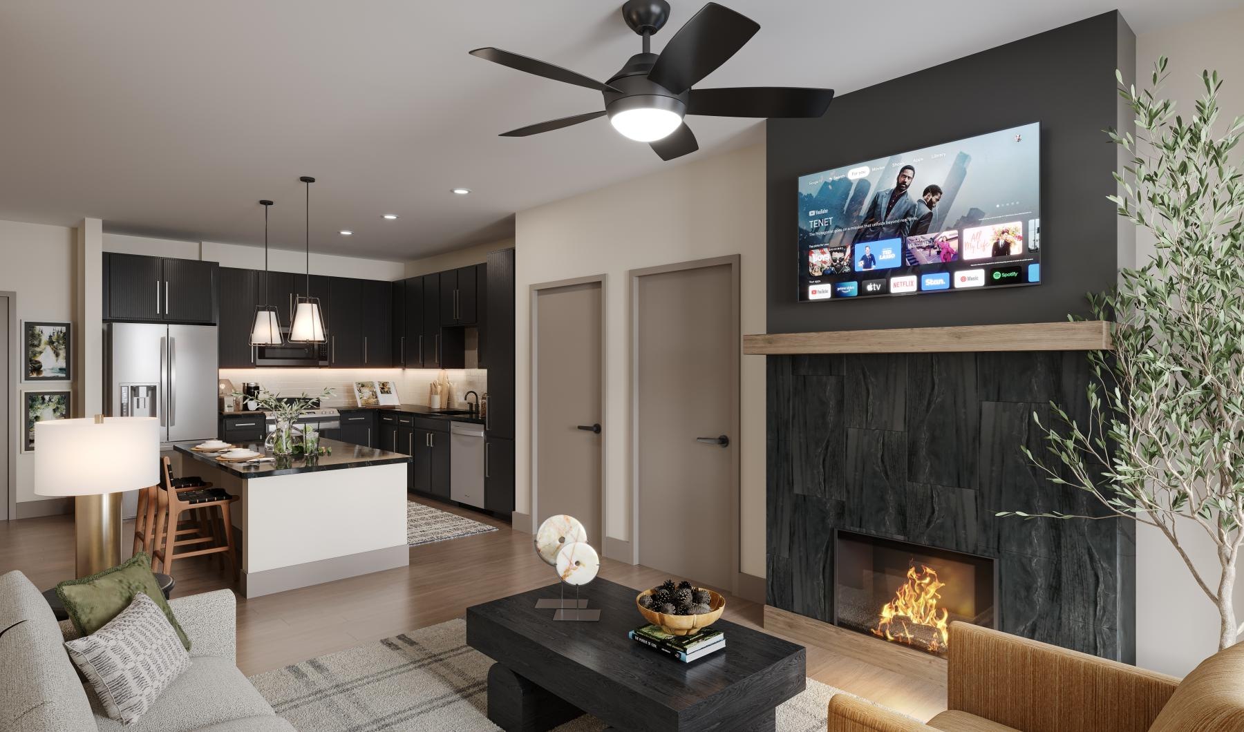 a living room with a fireplace and a tv