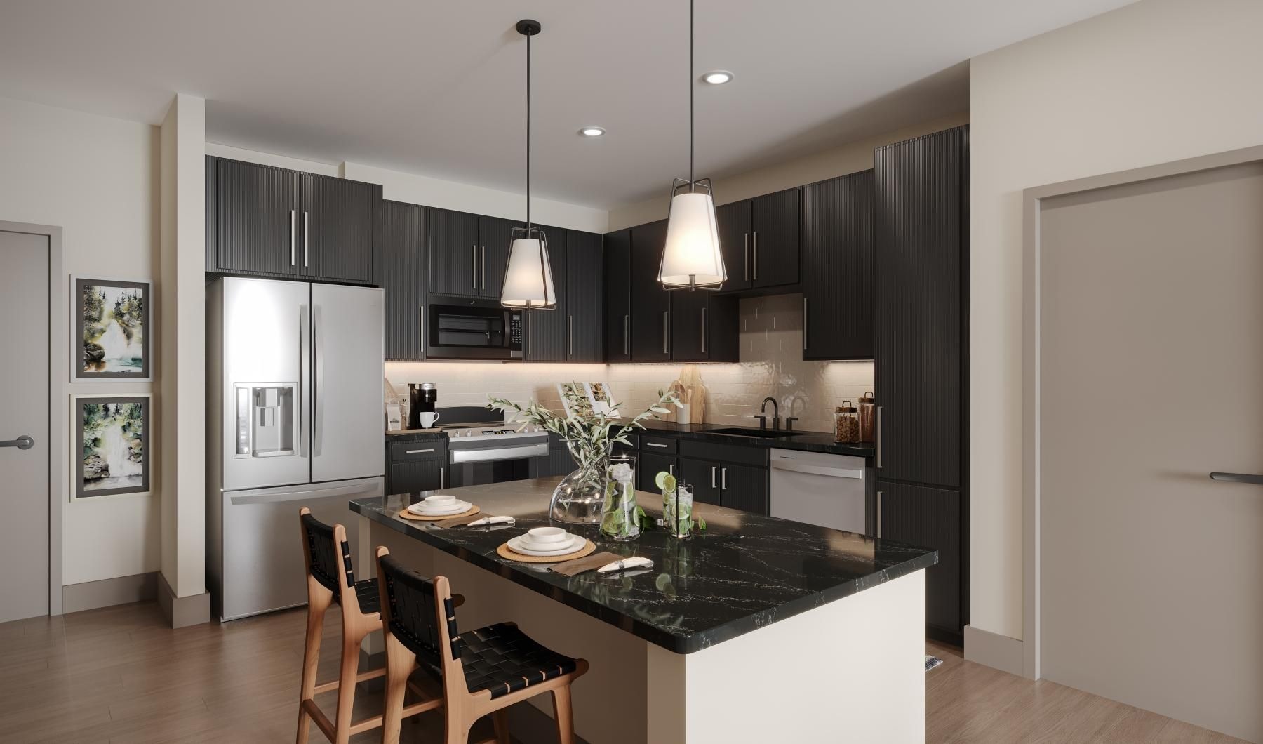 a kitchen with a black island